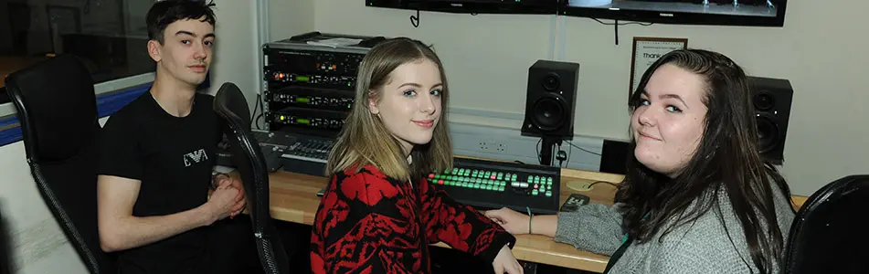 students working on sound board